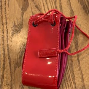 MAC red jewelry bag